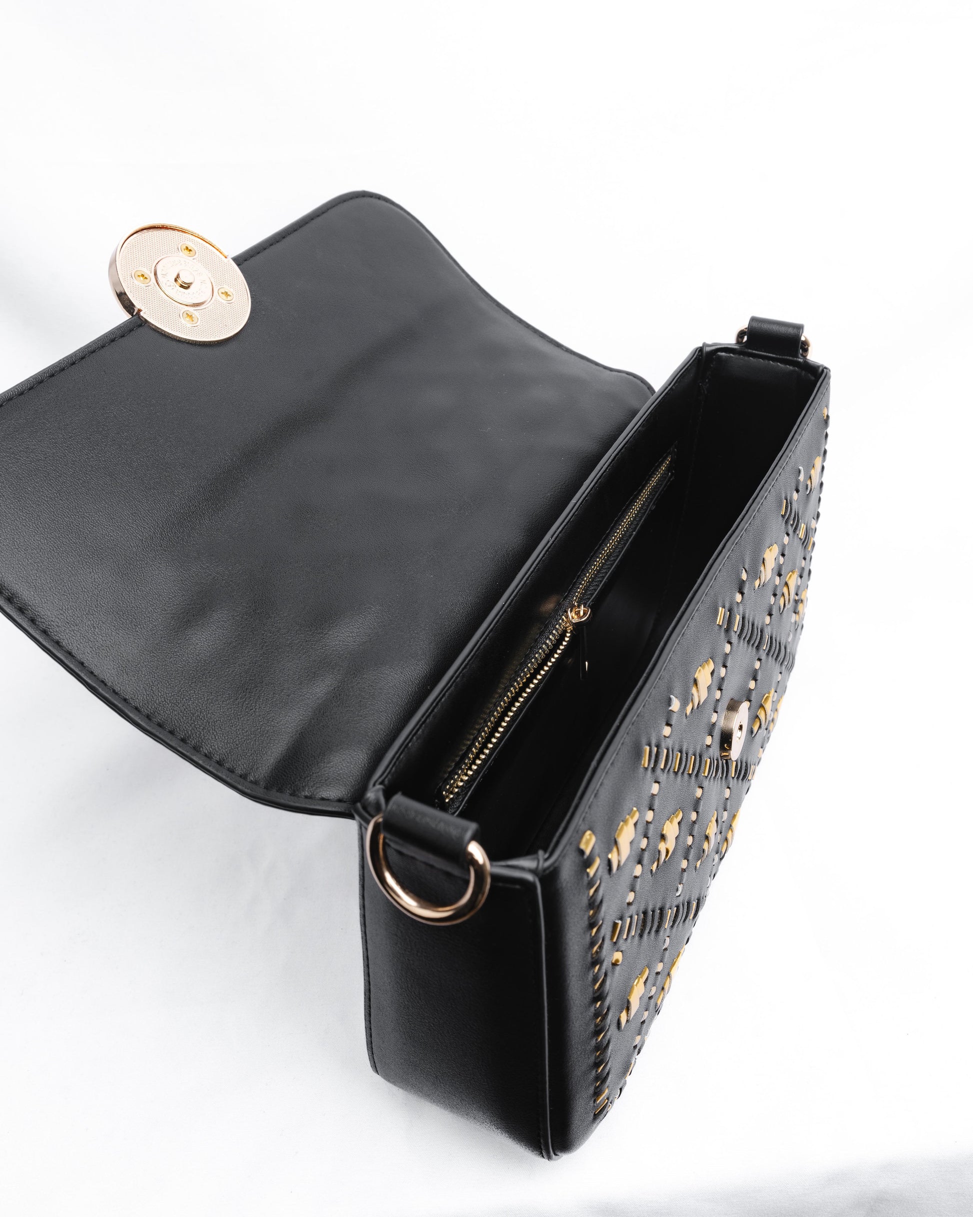 Black handbag with gold weaves.