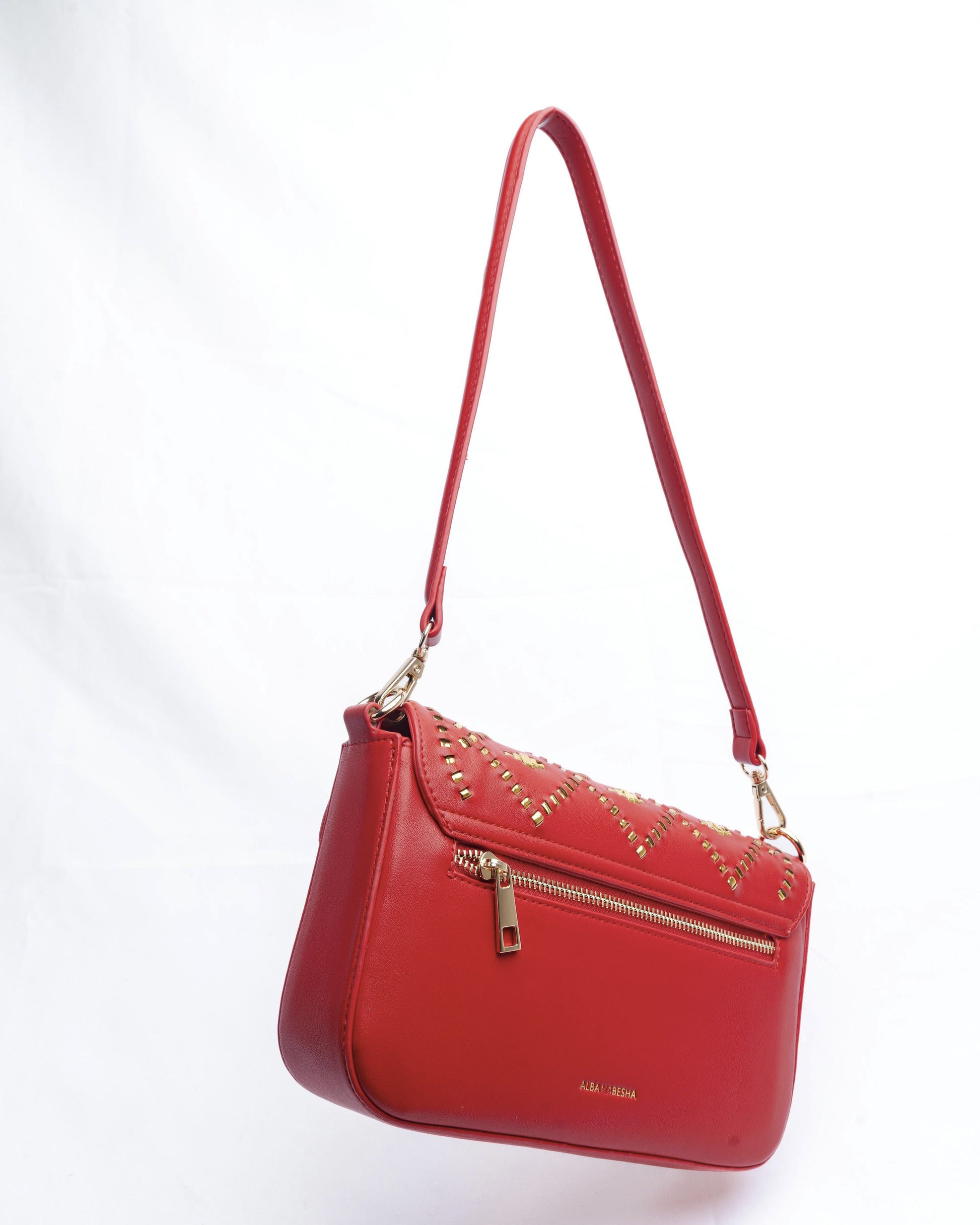Red handbag with gold weaves.
